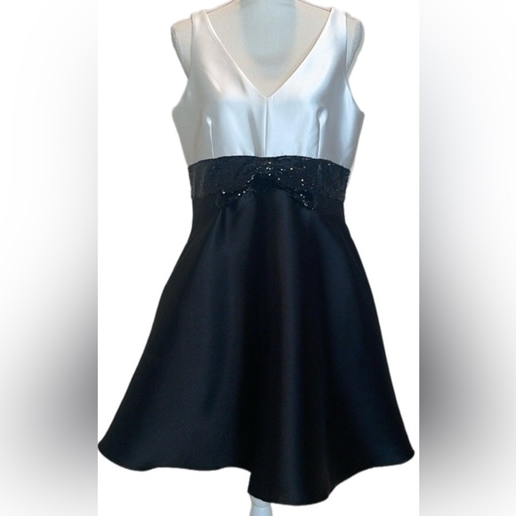 Kate Spade Sequin Bow Fit-and-Flare Dress. Lined and has pockets. …